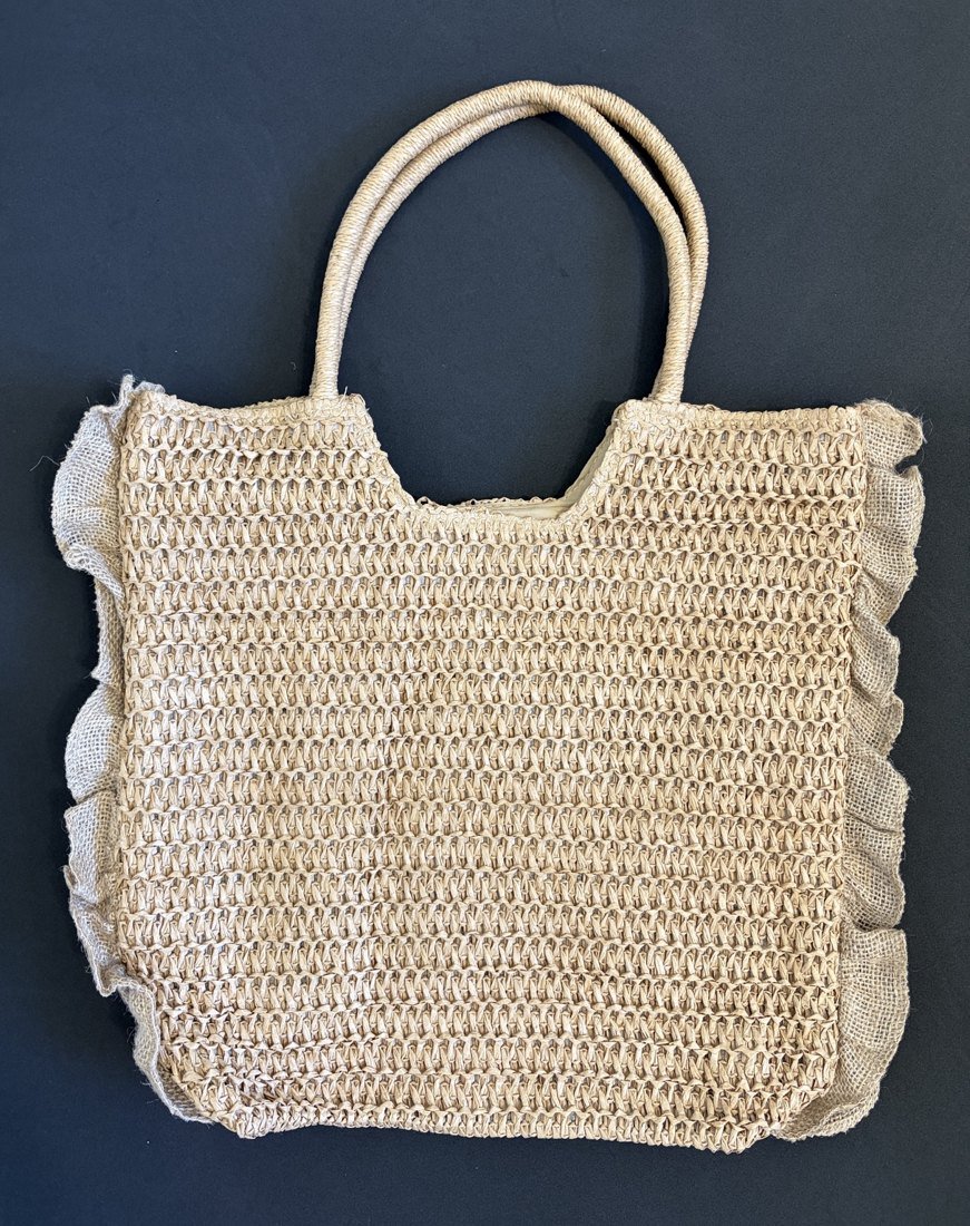 Bolso tejido de textura natural
